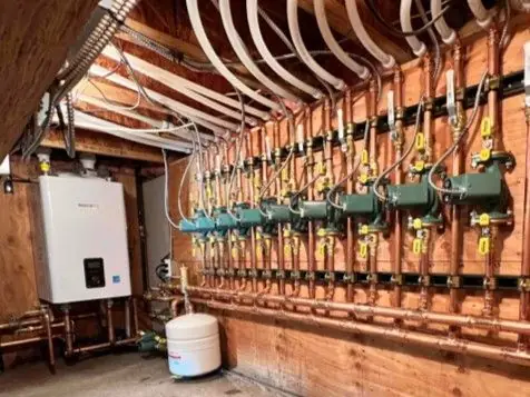 Navien tankless water heater with a multi zone manifold